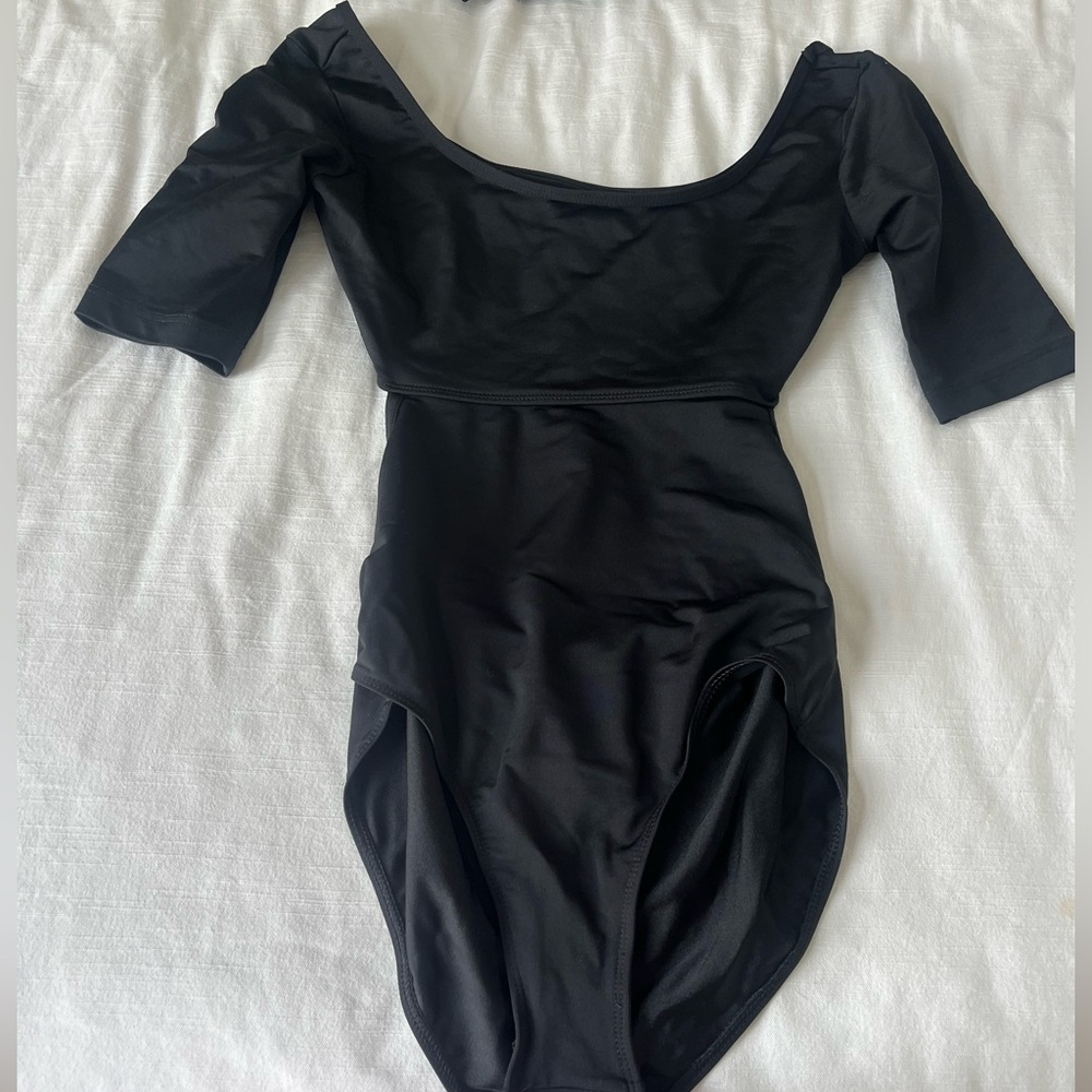 Quarter sleeve leotard with open back